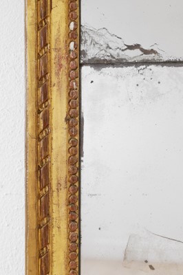 Lot 4 - A Louis XVI carved giltwood pier mirror