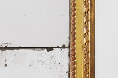 Lot 4 - A Louis XVI carved giltwood pier mirror