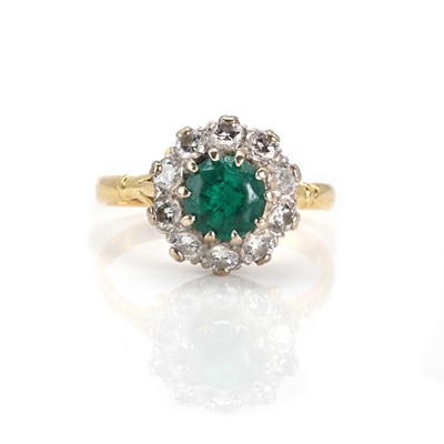 Lot 147 - 18ct gold diamond and synthetic emerald cluster ring