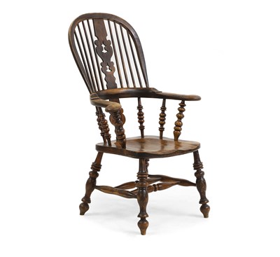 Lot 667 - A North Country elm and ash Windsor armchair