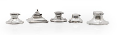 Lot 41 - A group of five single silver inkwells