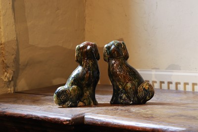 Lot 522 - A pair of glazed earthenware spaniels
