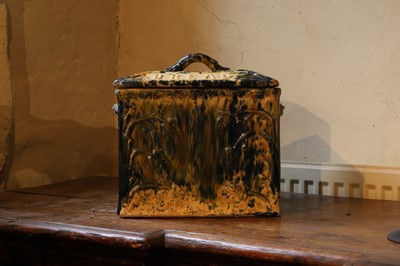 Lot 523 - A glazed earthenware bread bin and cover
