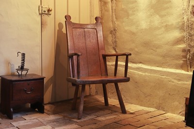 Lot 525 - A George III vernacular oak and ash armchair