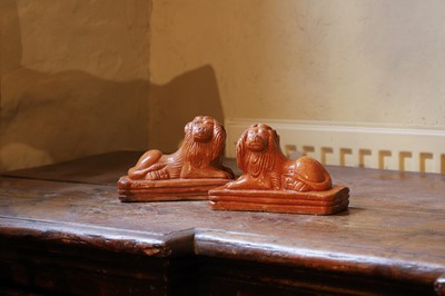 Lot 537 - A pair of glazed terracotta stoneware lions
