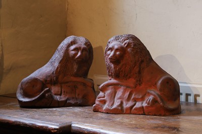 Lot 527 - A pair of large terracotta models of lions