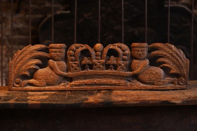 Lot 521 - A Charles II-style carved pine overdoor