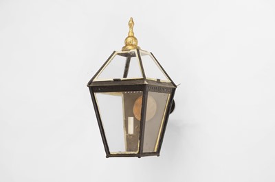 Lot 593 - A painted and parcel-gilt wall-mounted metal hall lantern