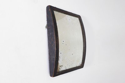 Lot 108 - An ebonised wooden convex mirror