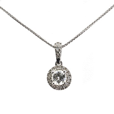 Lot 115 - A platinum diamond cluster pendant