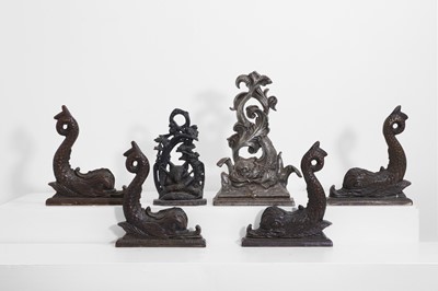 Lot 111 - A collection of six bronze doorstops