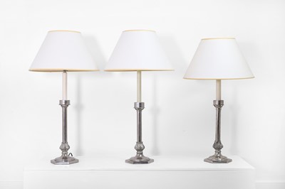Lot 85 - A set of three silvered-metal 'Palmer' table lamps by Charles Edwards