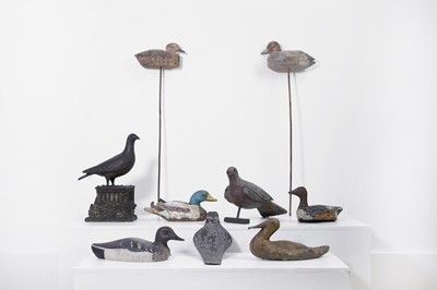 Lot 134 - A group of carved and painted decoy birds