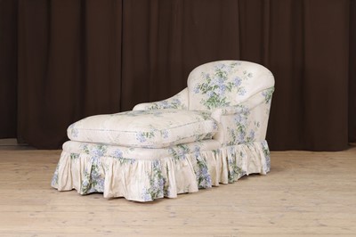 Lot 601 - An upholstered chair-back chaise longue in the style of Howard & Sons