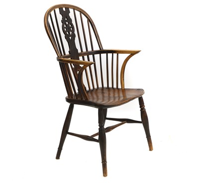 Lot 553 - An ash and elm high hoop back Windsor armchair