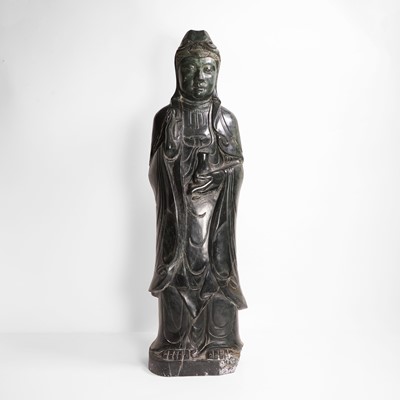 Lot 125 - A large Chinese spinach jade carving