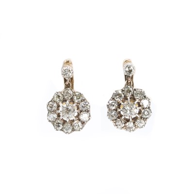 Lot 74 - A pair of diamond drop earrings