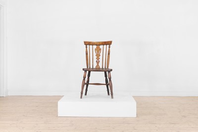 Lot 109 - A fruitwood and elm Windsor single chair
