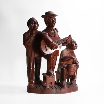 Lot 602 - A carved mahogany figural group