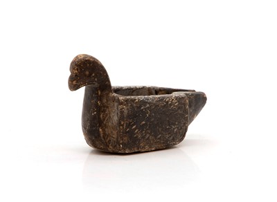 Lot 474 - A carved hardstone oil pourer or oil lamp