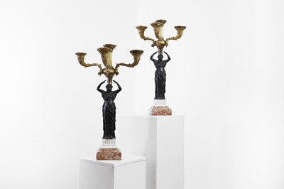 Lot 183 - A pair of Empire-style gilt and patinated bronze five-light candelabra