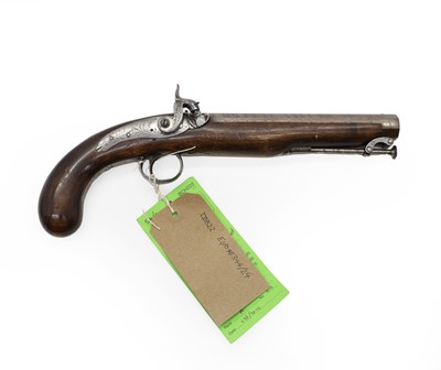 Lot 195 - An English walnut holster percussion pistol