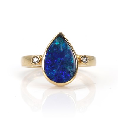 Lot 136 - An opal doublet and diamond ring