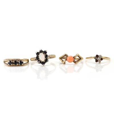 Lot 227 - A group of four gemstone set rings