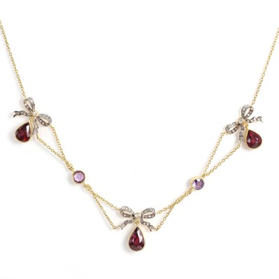 Lot 121 - A silver gilt ruby, amethyst, moonstone and diamond swag necklace