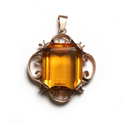 Lot 39 - An orange paste pendant