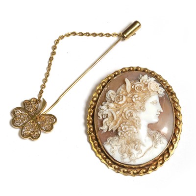 Lot 235 - A 9ct gold quatrefoil stick pin and a cameo brooch