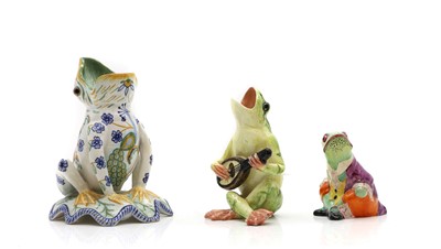 Lot 320A - Three pottery figures of frogs