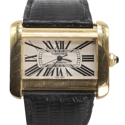 Lot 292 - An 18ct gold Cartier Tank Divan automatic strap watch