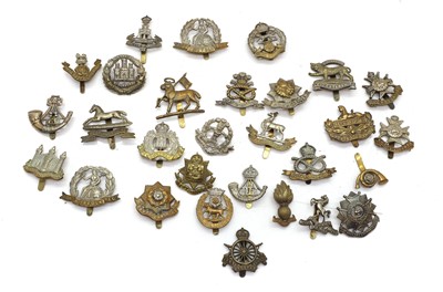 Lot 105 - A large collection of cap badges
