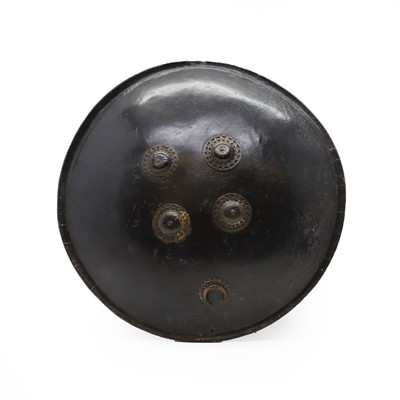 Lot 232 - An Indian leather shield
