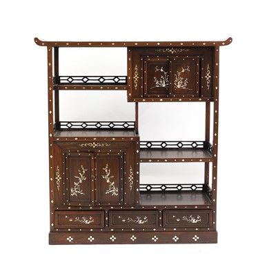 Lot 585 - A Chinese hardwood cabinet