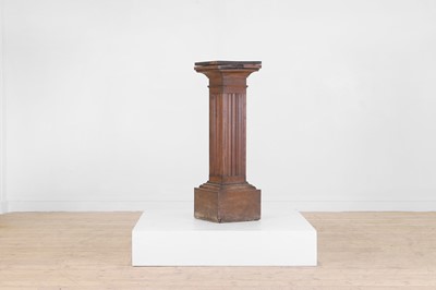 Lot 98 - An oak torchère