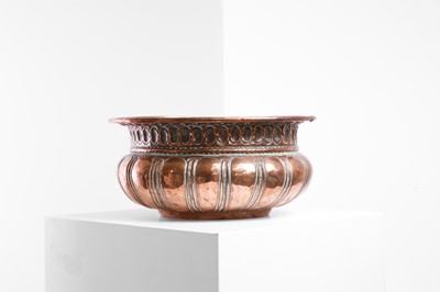 Lot 339 - A repoussé copper basin