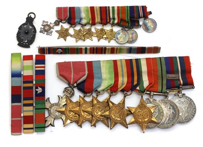 Lot 98 - A Second World War OBE medal group of nine awarded to Lt. CMDR Paul Godfrey