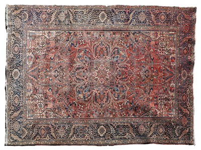 Lot 515 - A Persian Heriz wool carpet
