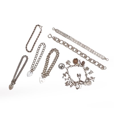 Lot 318 - A group of silver bracelets