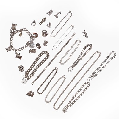 Lot 317 - A group of silver bracelets and charms