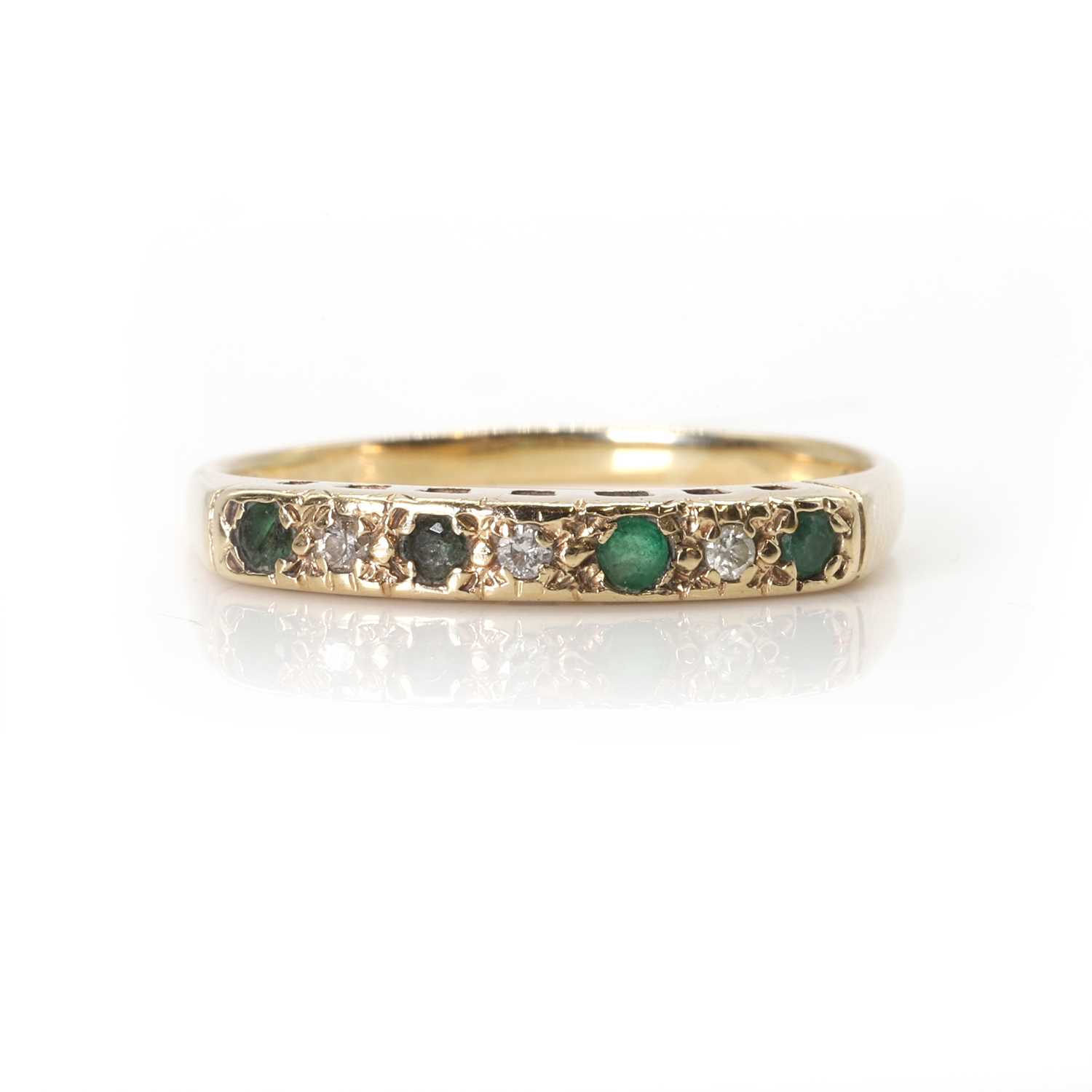 Lot 88 - A 9ct gold emerald and diamond ring