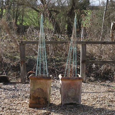 Lot 689 - A pair of terracotta garden urns