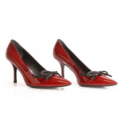 Lot 540 - A pair of Prada patent leather heels