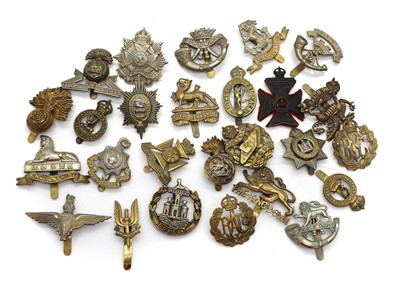 Lot 103 - A large collection of cap badges