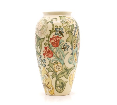 Lot 279 - A Moorcroft pottery 'Golden Lily' pattern vase