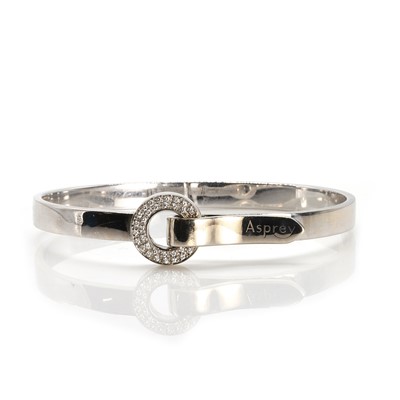 Lot 136 - An 18ct gold diamond 'Bond' bangle, by Asprey