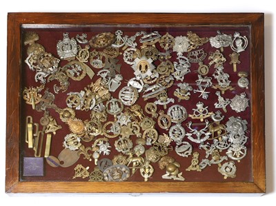 Lot 169 - A collection of approx one hundred and twenty metal and gilt British Army cap badges