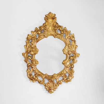 Lot 206 - A gilt composition oval mirror